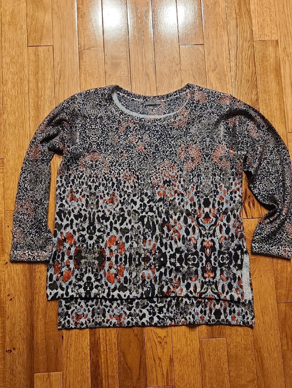 Nally & Millie Multi-Color Animal Print Knit Top